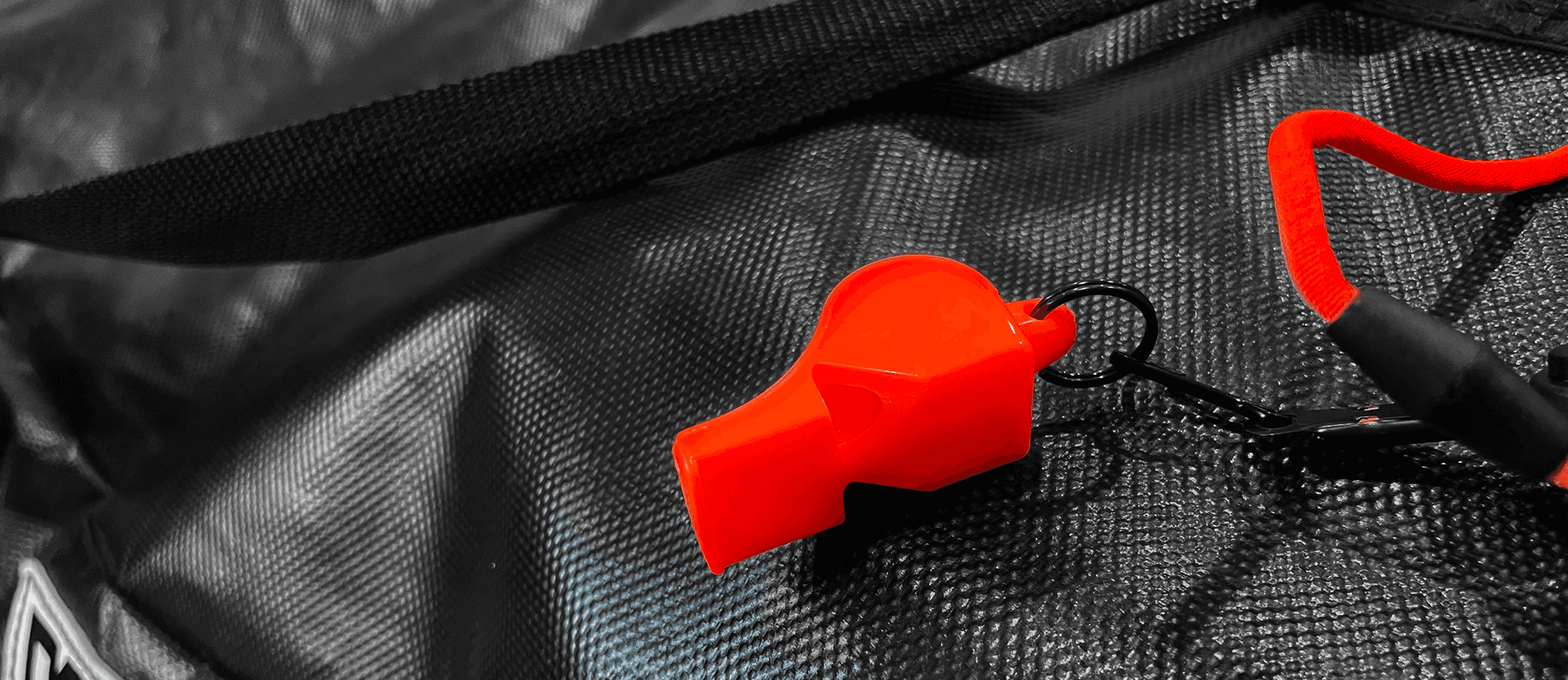Close up of bag and whistle