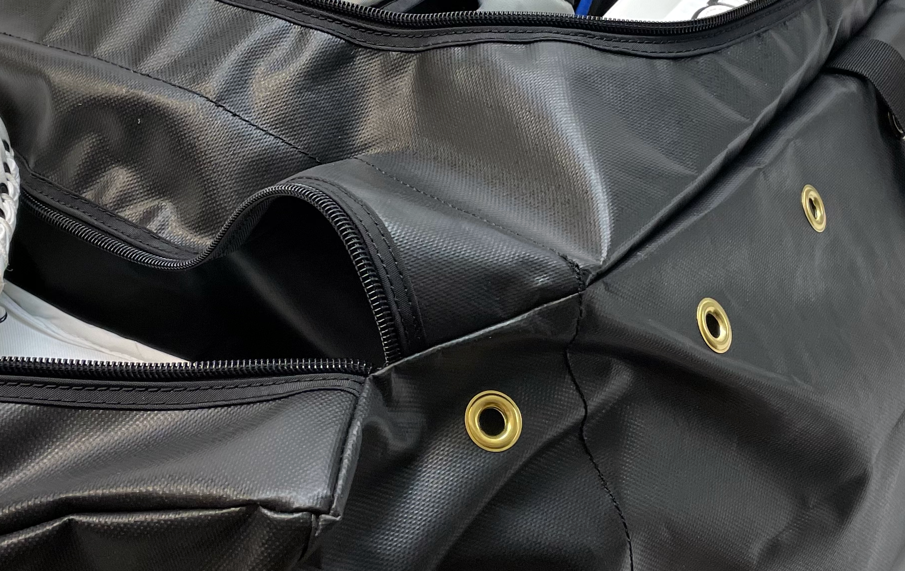 Close up of hockey bag open zipper pockets