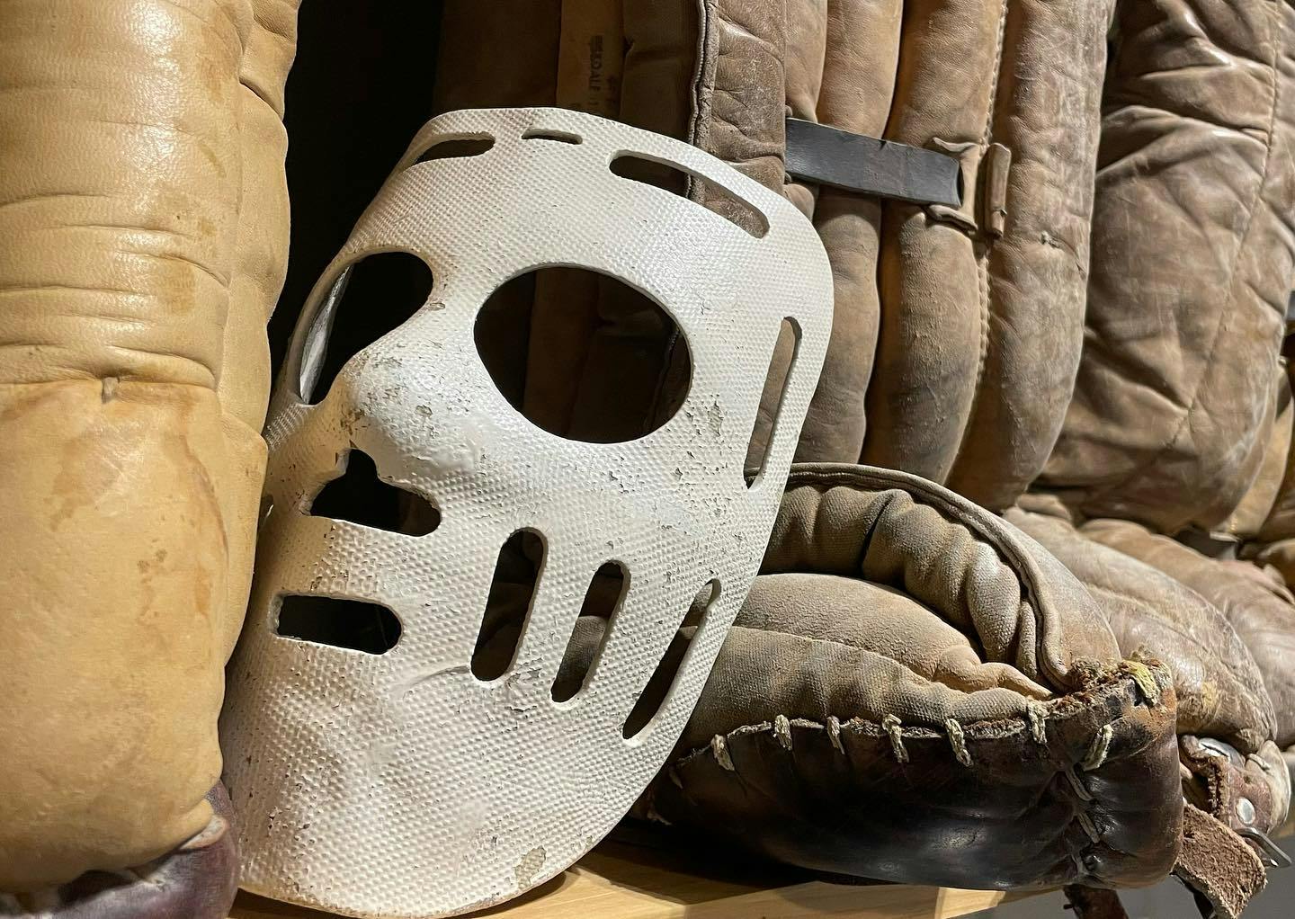 Old mask and goalie pads