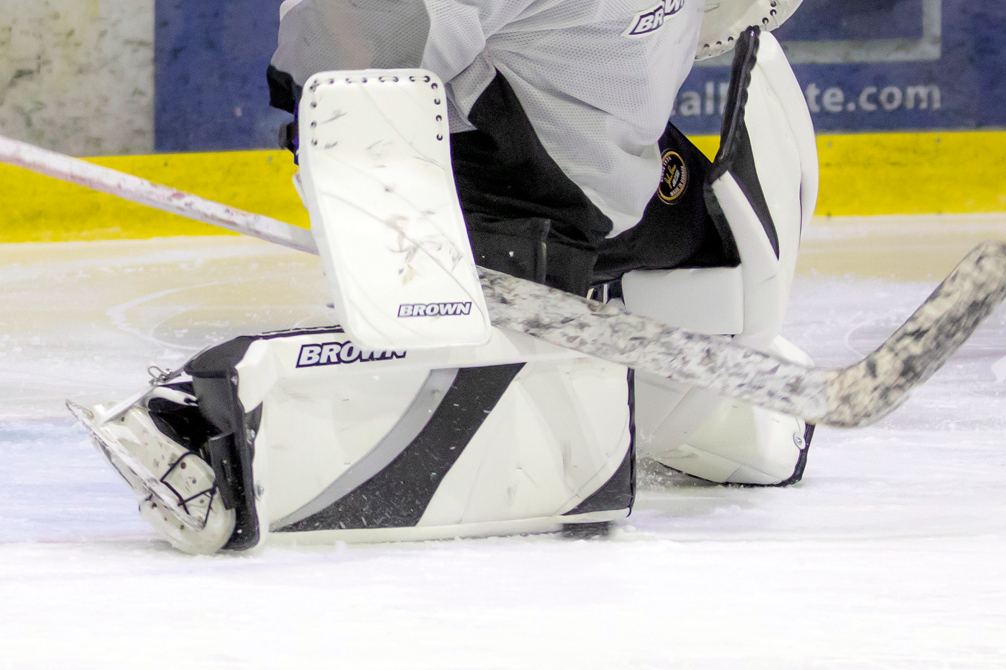 Goalie making a save with leg pad