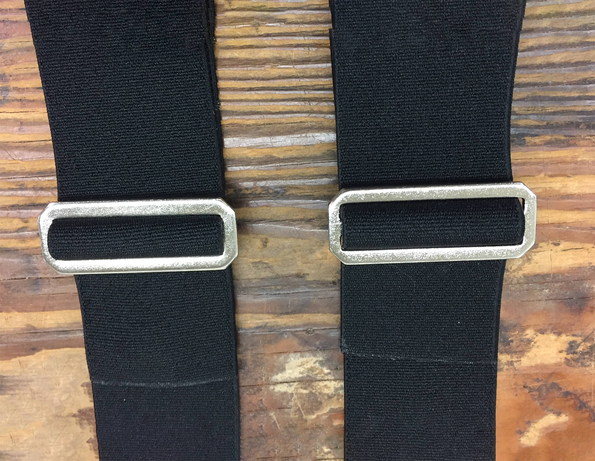 Two metal slides with elastic